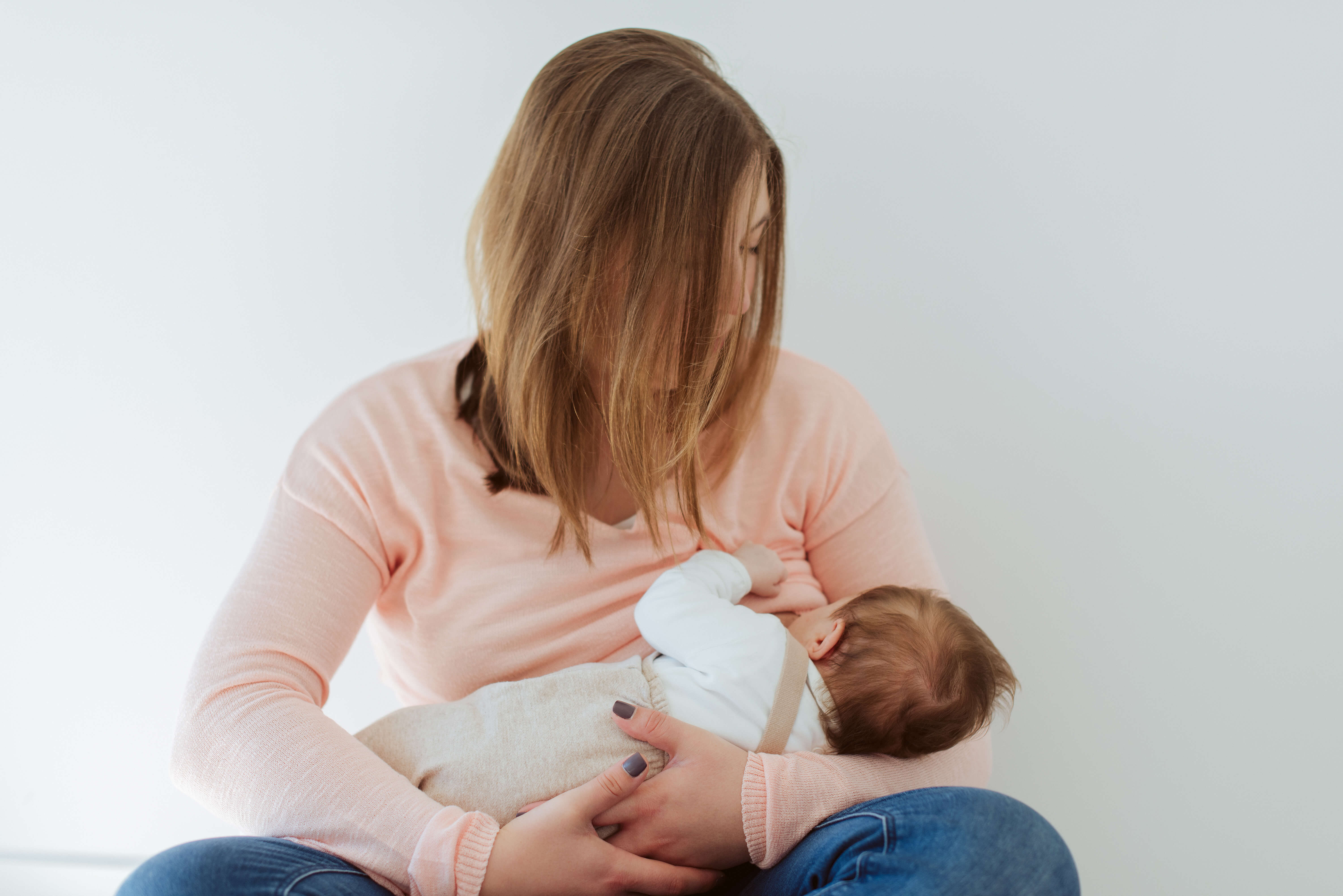 https://elements.envato.com/mother-with-baby-during-breastfeeding-6S9L6W4 